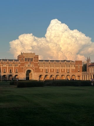 Lovett Hall with a large cloud behind it.
