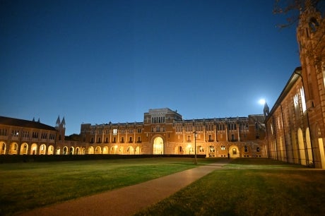 Lovett Hall, lit up at dusk.