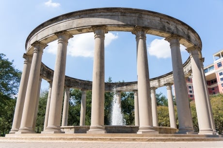 Circular structure with columns surrounding a fountain.